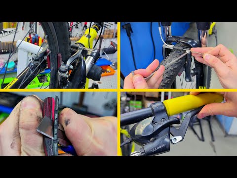 Adjusting v-brake bike brakes. Brake pad burrs.