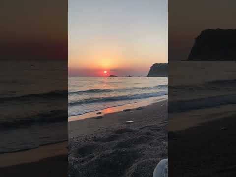 Beautiful sunset view at Buljarica beach in Montenegro filled with relaxing sounds of the sea.