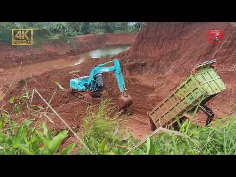 How could that be? Excavator digs deep into the ground