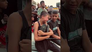 Palestinian boy holds shoes of killed father | #AJshorts