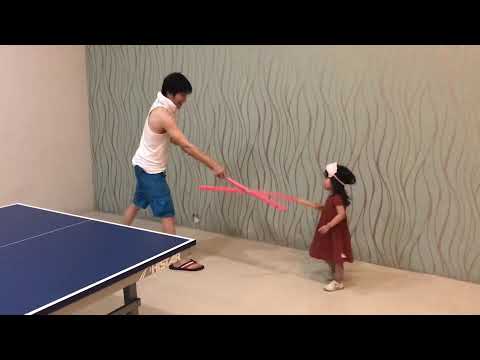 Father Daughter Fencing with Foam Stick