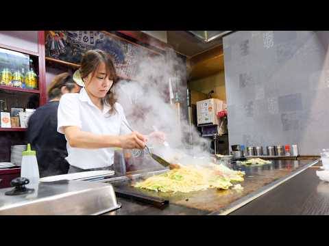 A close look at an okonomiyaki restaurant run by a beautiful owner whose Yakisoba sells very well.