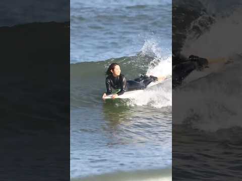 A beautiful surfer found at the beach.