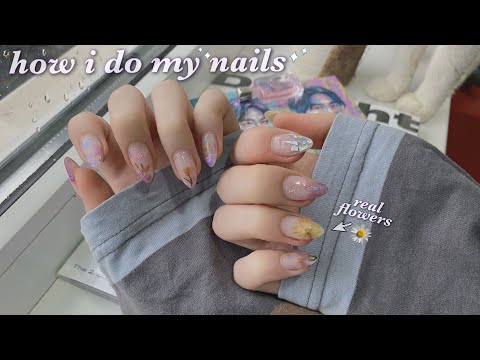 doing nail art using flowers from my backyard