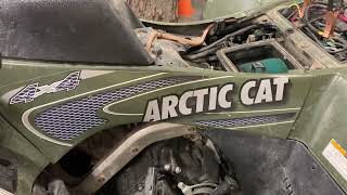 Spark plug location Arctic Cat 500 ATV