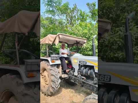 Trying my hand at driving the tractor at the farm....