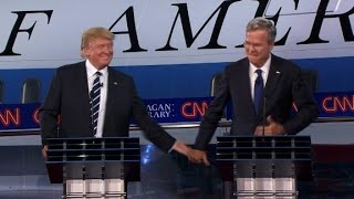 Trump gives Bush a low-five after debate joke