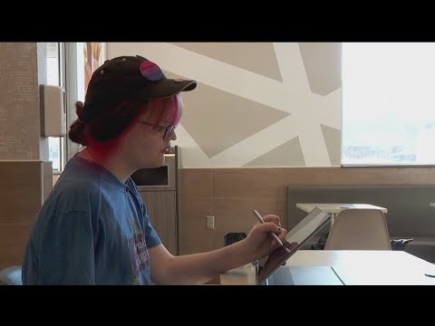 McDonald's worker with disability breaks barriers with art