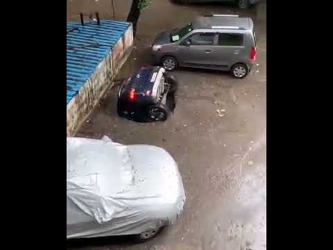 Maharashtra: A viral video shows a car sinking in a sinkhole in Mumbai's Ghatkopar | #Shorts