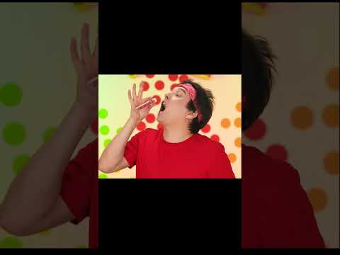 guy eating red candy