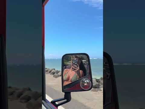 Driving along the Pacific Ocean in my Red Jeep