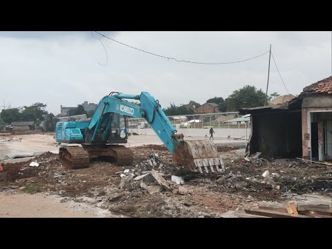 KOBELCO SK200 Excavator Scraping The Ground for Overpass Road Construction