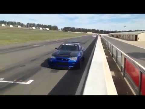 R34 GT-R passing main straight of Wakefield Park