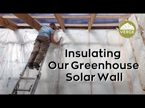 Insulating The Solar Wall in Our Passive Solar Greenhouse