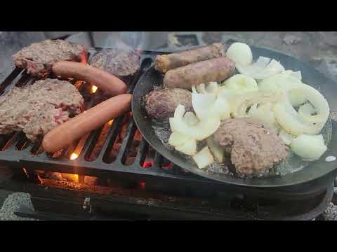 trying out my new lodge sportsman grill at camp.