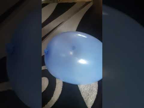 popping balloon with needle