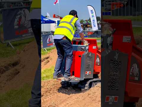 Riding a mini tracked dumper