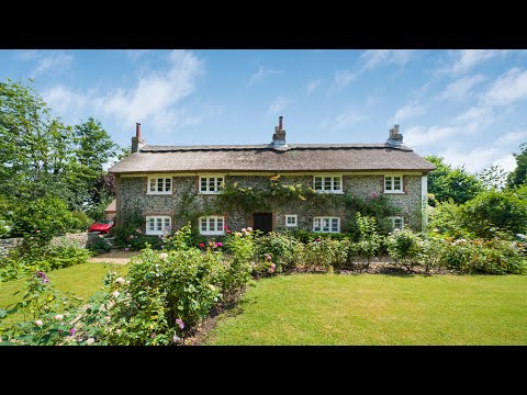 Flint Façade & Thatched Roof Home | Modern Comfort & Historic Charm - Fine & Country Chichester