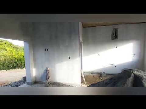 Building a villa in the Dominican Republic. Primed walls, windows ordered.