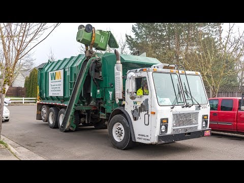 Mack LE - Amrep Octagonal Side Load Garbage Truck