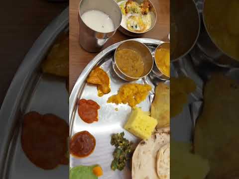 Delicious Veg Thali with around 30+ items Can you identify? #vegthali #nashikfood  #gujratithali