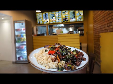 Indo-Chinese: Garlic Mushroom | Fried Rice | Masala Chips | Chilli Paneer Roll + more at Wok & Slice