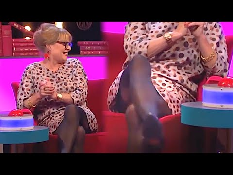 Janet Ellis Flashes Her Stocking Tops!!!