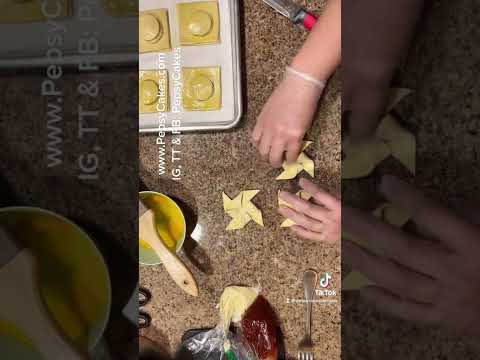 Making some puff pastries.     Pinwheel shaped. Filled with guava and cheese