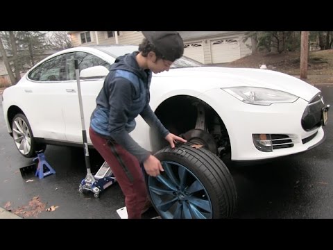 15 Year Old Fixes a Flat Tire On a Tesla For The First Time: How to Fix a Flat