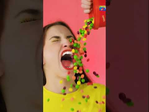 Spilling all Skittles on a friend