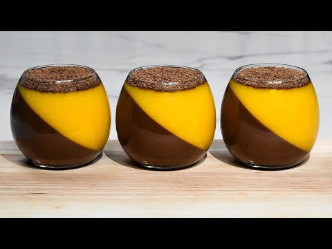 Chocolate mango cream dessert panna cotta in cups.