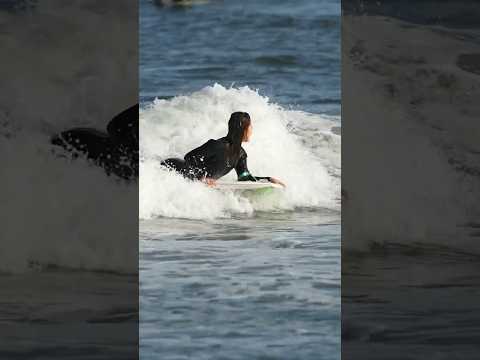 A beautiful surfer found at the beach.