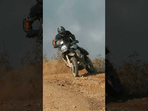 Powering hard, fully crossed up on the KTM AMT.