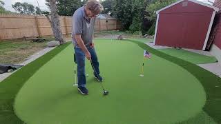 Putting on Star Pro Greens backyard Green.