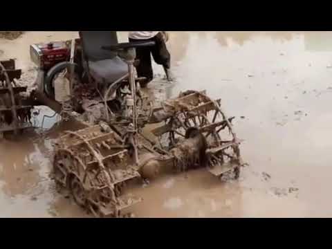 Handmade 4WD paddy field tillage machine