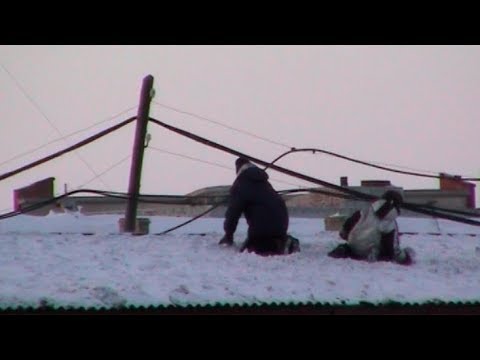 Children playing on the roofs of Khatanga - Geographic North Pole 2002 expedition