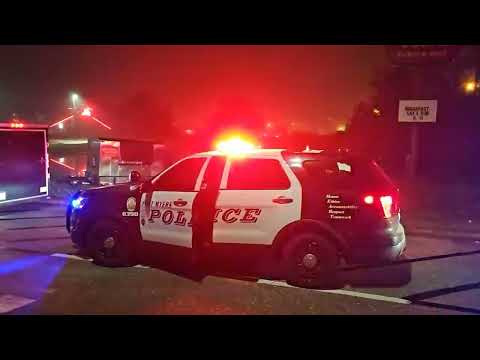 MAN TRIES KICKING HIS WAY OUT OF BACK OF COP CAR