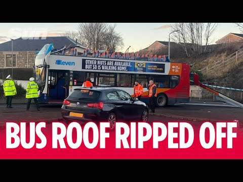 Double decker bus roof ripped off in shocking crash with railway bridge in Kilmarnock