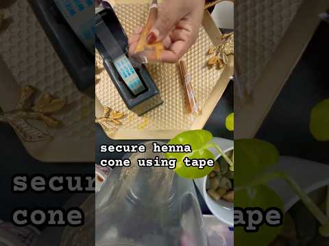 Secure henna cone using tape