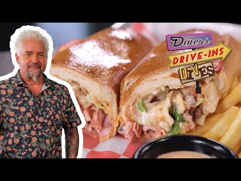 Guy Fieri Returns to Authentic Puerto Rican Spot in FL | Diners, Drive-Ins and Dives | Food Network