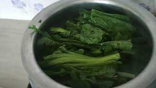 Boil vegetable lai patta( mustard leaf) or lai xak.