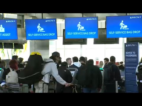 Holiday travel surge heats up at RDU but travelers stay enthused