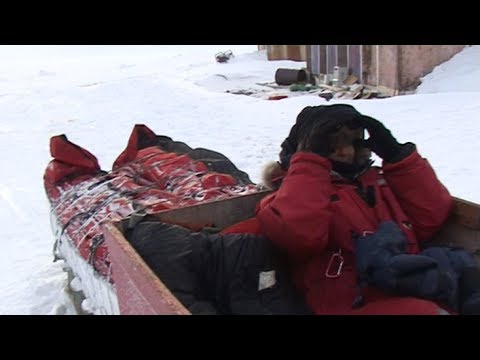 Sitting down on the sled for comeback to Clyde River - Sam Ford Fiord 2010 expedition