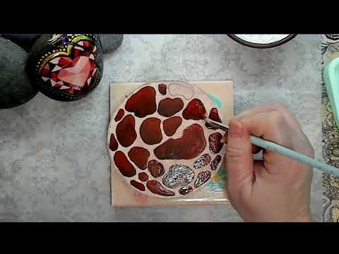 Pattern of a giraffe's fur painted on round watercolor paper.  #watercolorpainting