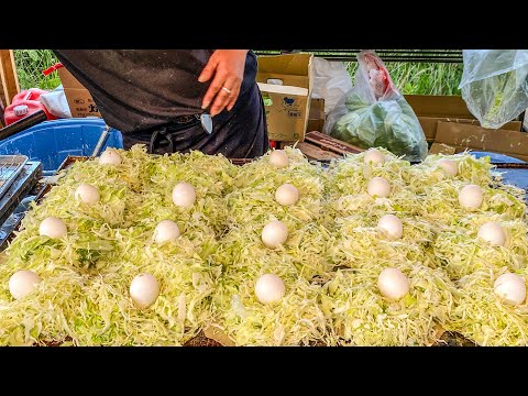 japanese street food - hiroshima style okonomiyaki stall お好み焼き