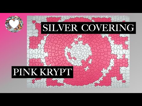 Building Silver Krypt Jigsaw Puzzle on top of Pink from Ravensburger