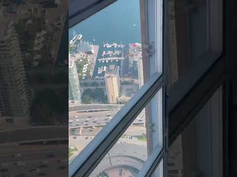 Stunning view of Toronto Harbourfront and the Toronto Islands from the CN Tower lift!