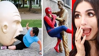 PEOPLE MESSING AROUND WITH STATUES