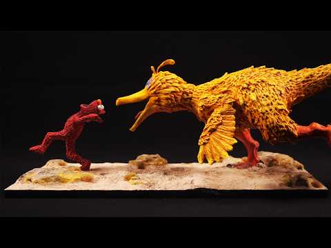 I made Big Bird as a dinosaur chasing Elmo