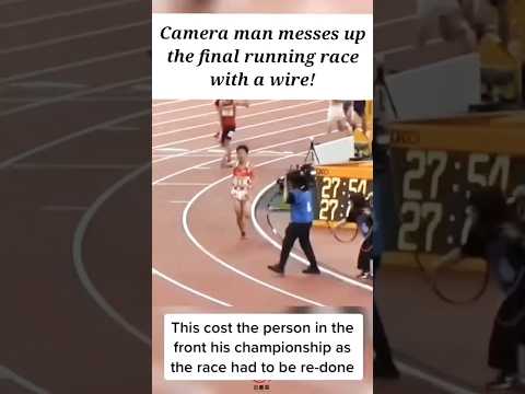 Camera man messes up the final running race with a wire ..